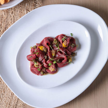 Porto Brasil NEW WHITE OVAL DESSERT PLATE ORGANIC STONEWARE dia. 8.86"  SKU: '15414119801