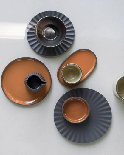 Revol PEKOE PLATE 17CM Black Smooth SKU: '653638