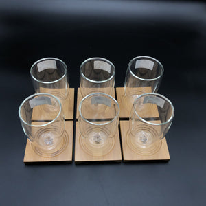 A Set Of 6 Bamboo Coaters/ Trays With 6 Doublewalled Thermo Glasses To Match